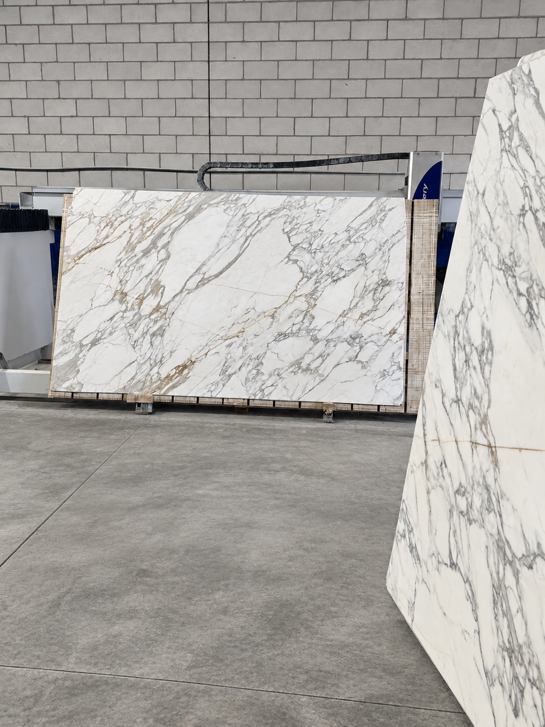 Large veined stone slabs prepared for fabrication